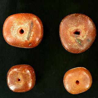 Fourteen rare old amber beads from West Africa 05.05.362